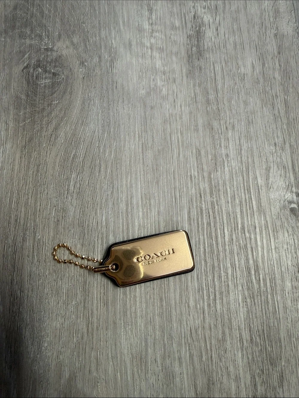 Coach Brown Leather Key Tag with Gold Metal Logo Plate